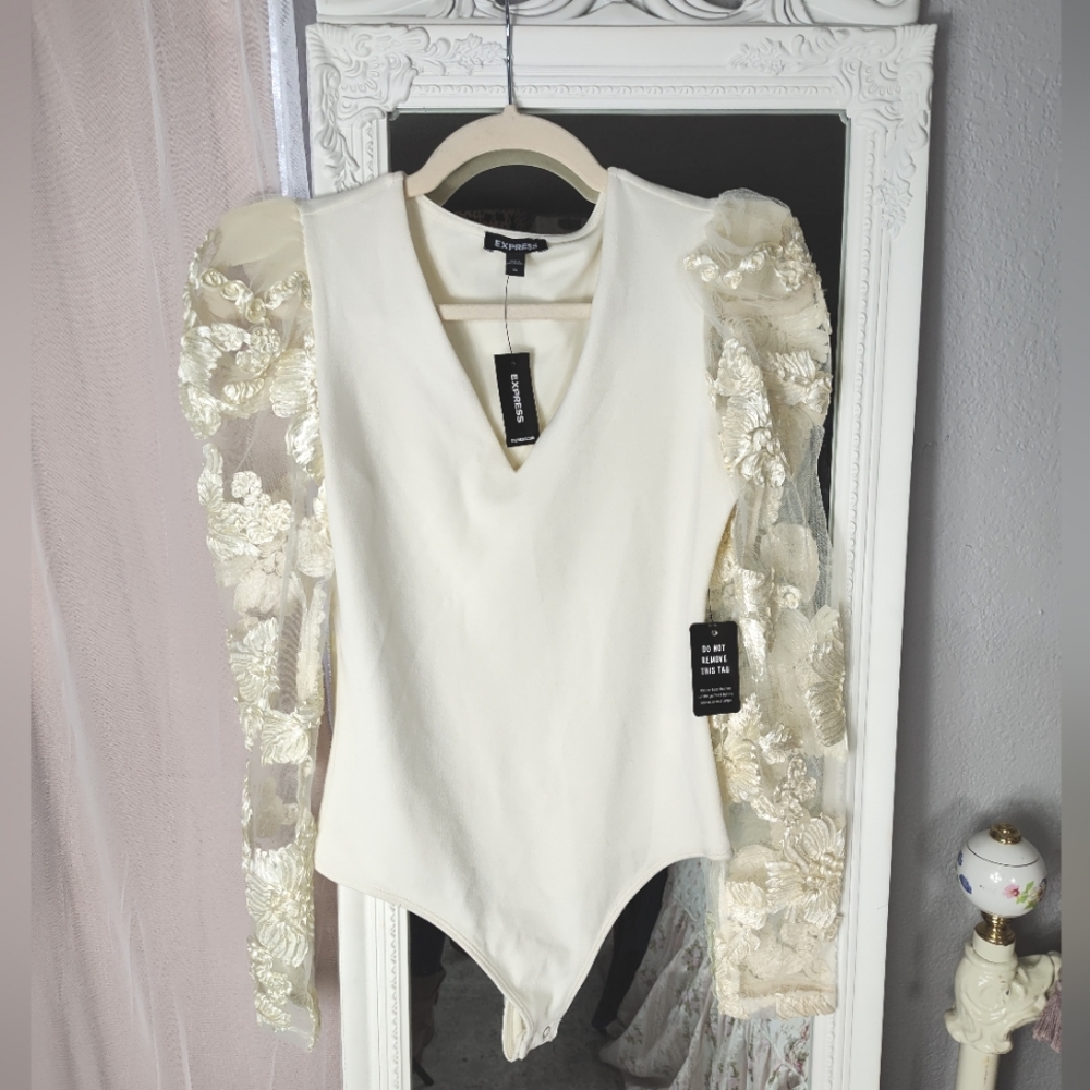 Express bodysuit. Sheer arms with floral sleeves.